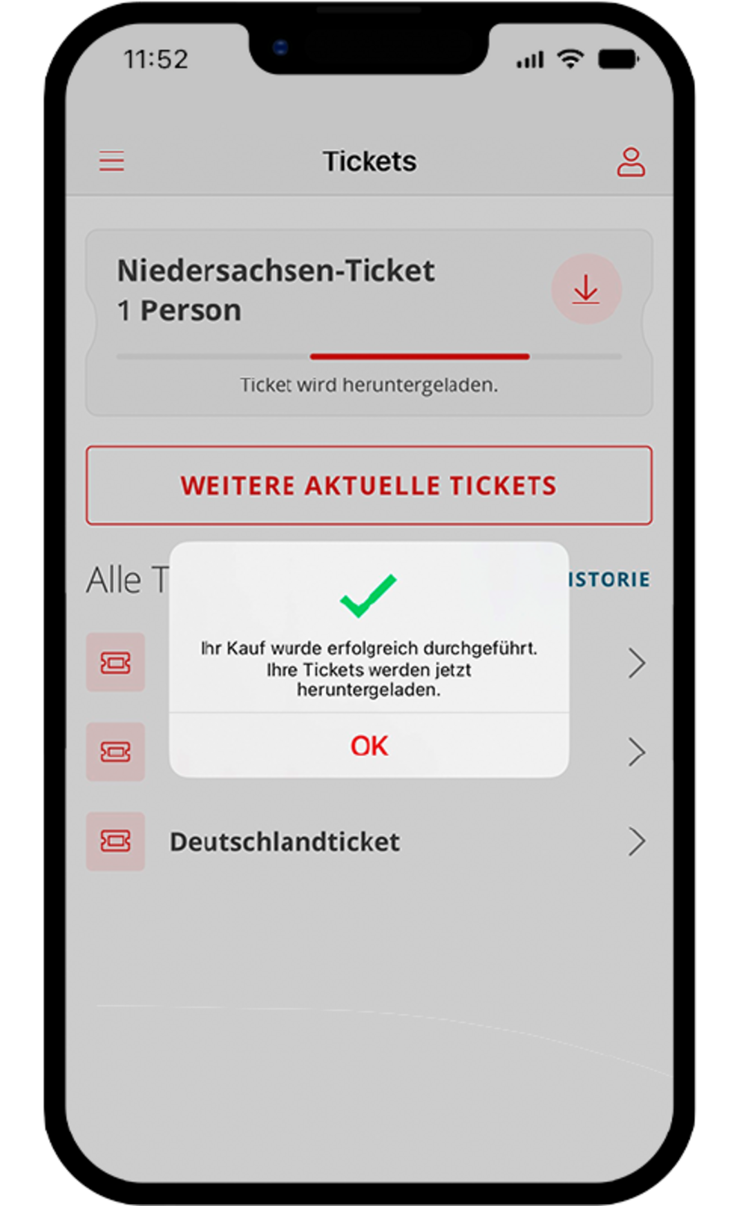 Bestätigungsbildschirm in der FahrPlaner-App nach dem Ticketkauf. Eine Meldung mit grünem Haken zeigt an, dass der Kauf erfolgreich war und das Ticket heruntergeladen wird. Ein „OK“-Button bestätigt die Nachricht.